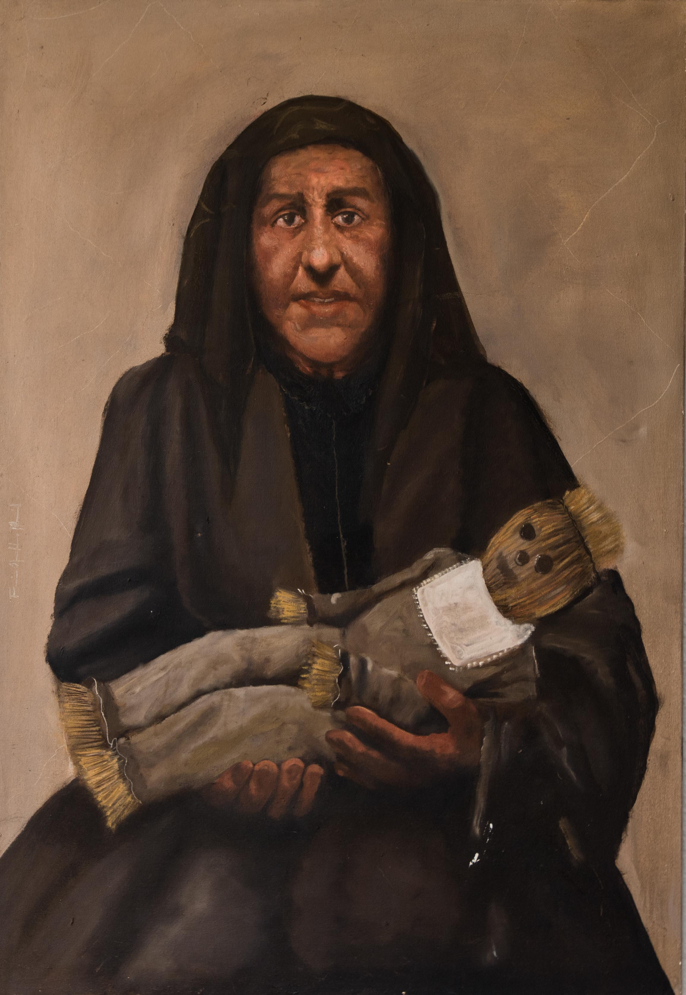 Mujer con muñeco de paja